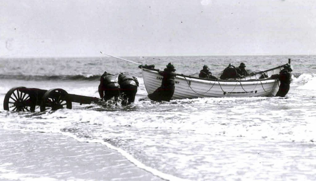capemay-surfboat-drill A surf boat and rescuers during a drill at Cape May in about 1915. (U.S. Lifesaving Service Heritage Association)