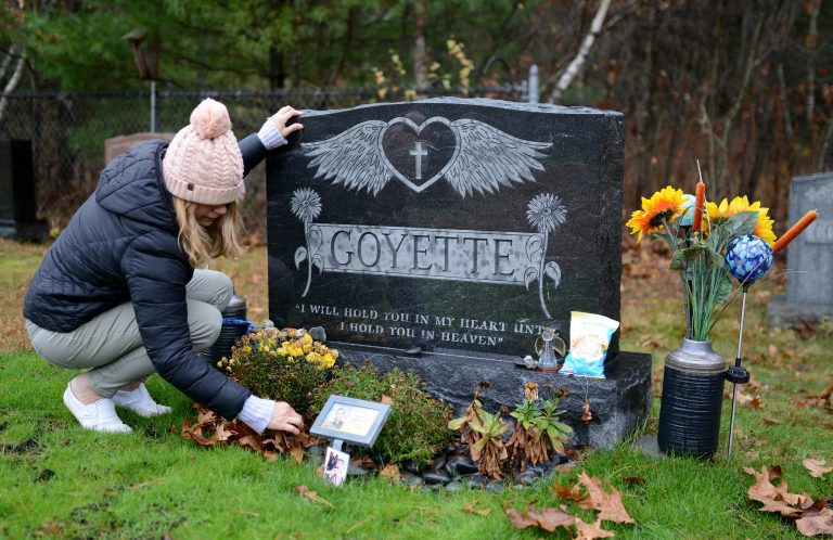 Shannon Goyette visits her son Jacob's grave in Shirley, Mass. The 16-year-old died by suicide last year. (Meredith Nierman/WGBH)