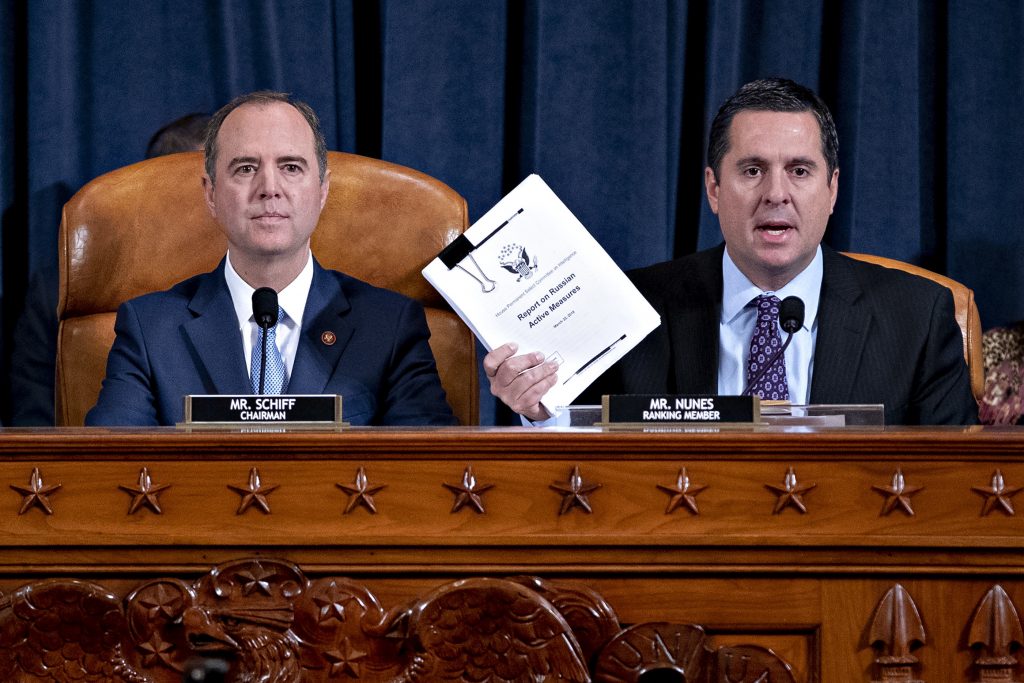 Rep. Devin Nunes, (R-Calif.) ranking member of the House Intelligence Committee, right, speaks as Rep. Adam Schiff, (D-Calif.) and chairman of the House Intelligence Committee, listens during an impeachment inquiry hearing on Capitol Hill Nov. 21, 2019. (Andrew Harrer/Getty Images)