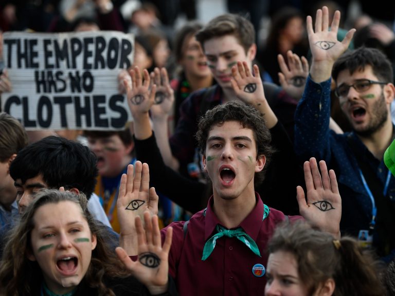 Demonstrators take part in a protest on climate emergency outside the U.N. Climate Change Conference COP25 in Madrid on Friday. (Pierre-Philippe Marcou/AFP via Getty Images)