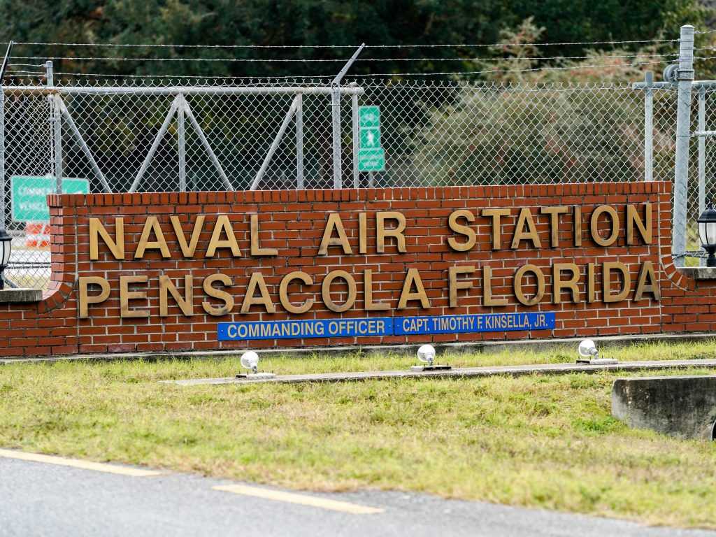 A gunman killed three people and injured eight others at Pensacola Naval Air Station on Friday. It was the second shooting on a U.S. Naval Base in a week. A gunman killed three people and injured eight others at Pensacola Naval Air Station on Friday. It was the second shooting on a U.S. Naval Base in a week. (Josh Brasted/Getty Images)