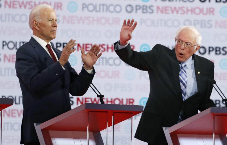 Democratic presidential candidates former Vice President Joe Biden, left, and Sen. Bernie Sanders, I-Vt., speak during a Democratic presidential primary debate Thursday, Dec. 19, 2019, in Los Angeles. (AP Photo/Chris Carlson)