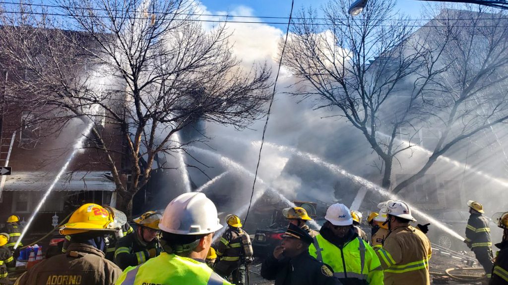 southphilly-rowhome-fire-crop Firefighters battle the rowhome blaze in South Philly on Thursday, Dec. 19TWITTER / @PHILLYFIREDEPT