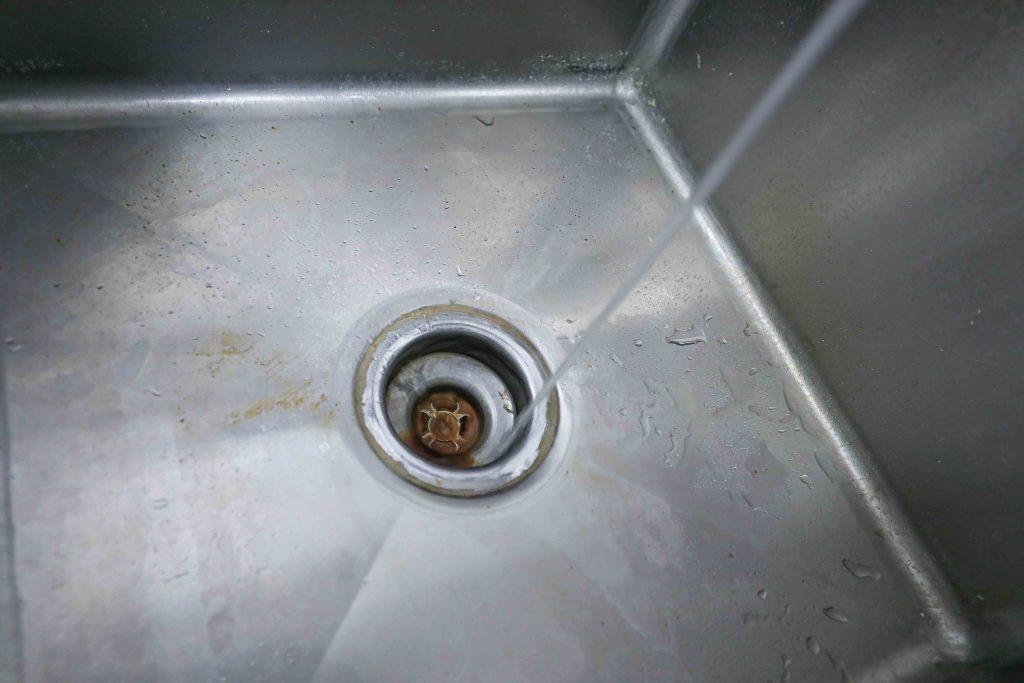 News 2019 – Sept 16 – Frankford Delaware community without clean drinking water for decades Dora Bell-Isler runs tap water to demonstrate the horrible smell coming from the faucet Monday, Sept.16, 2019, in Frankford, Del. (Saquan Stimpson for WHYY)