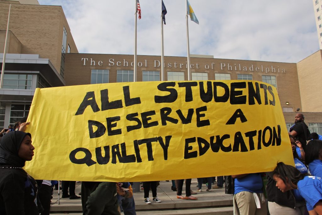 Parents and students rally outside Philadelphia School District headquarters. (Emma Lee/WHYY)