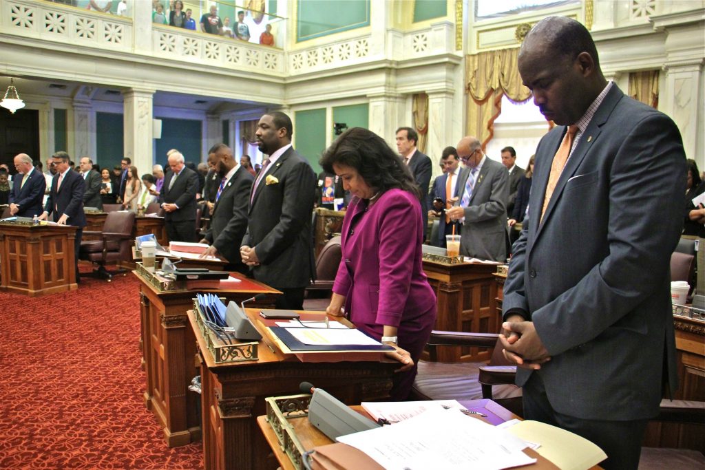 2016 06 16-philadelphia city hall-city council meeting Members of Philadelphia City Council stand for a prayer at the opening of a meeting at City Hall. (Emma Lee/WHYY, file)