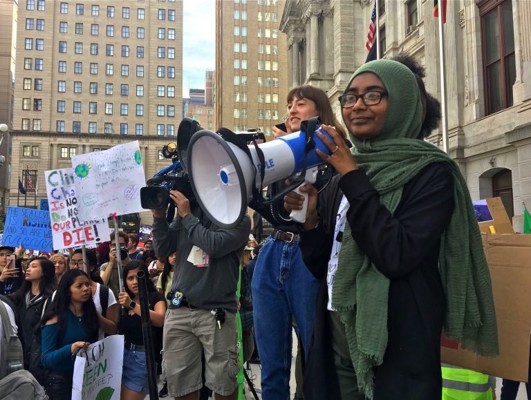 Sabirah Mahmud speaks at a Youth Climate Strike at Philadelphia City hall on Sept. 20, 2019. She is the lead Philly organizer for #ClimateStrike. (Catalina Jaramillo/WHYY)