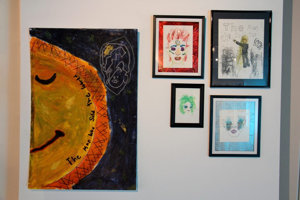 2020 01 02-e lee-liberty museum-david bowie exhibit Bowie inspired art by school children is and will hang above a creative corner where visitors can create their own Bowie artworks. (Emma Lee/WHYY)