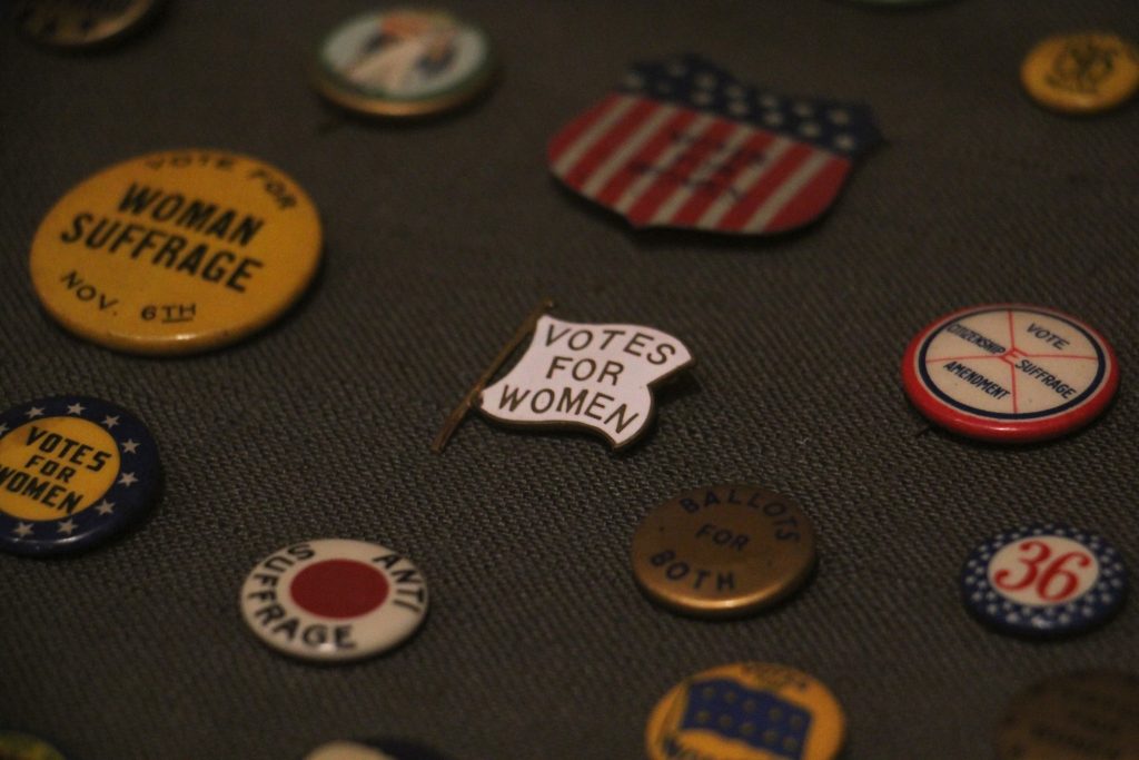 2020 01 30-e lee-brandywine museum-100 years of women’s suffrage A variety of pins and buttons were used by both sides of the women's suffrage campaign. (Emma Lee/WHYY)