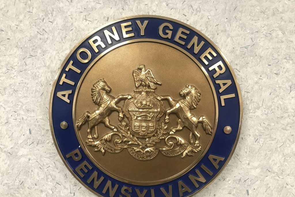 AG-sea-e1578957780839 The Pa. attorney general's office seal is posted at the Safe2Say Something crisis center Jan. 13, 2020. (Brett Sholtis/WITF)