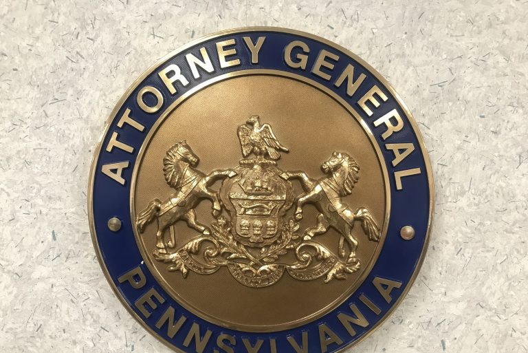 The Pa. attorney general's office seal is posted at the Safe2Say Something crisis center Jan. 13, 2020. (Brett Sholtis/WITF)