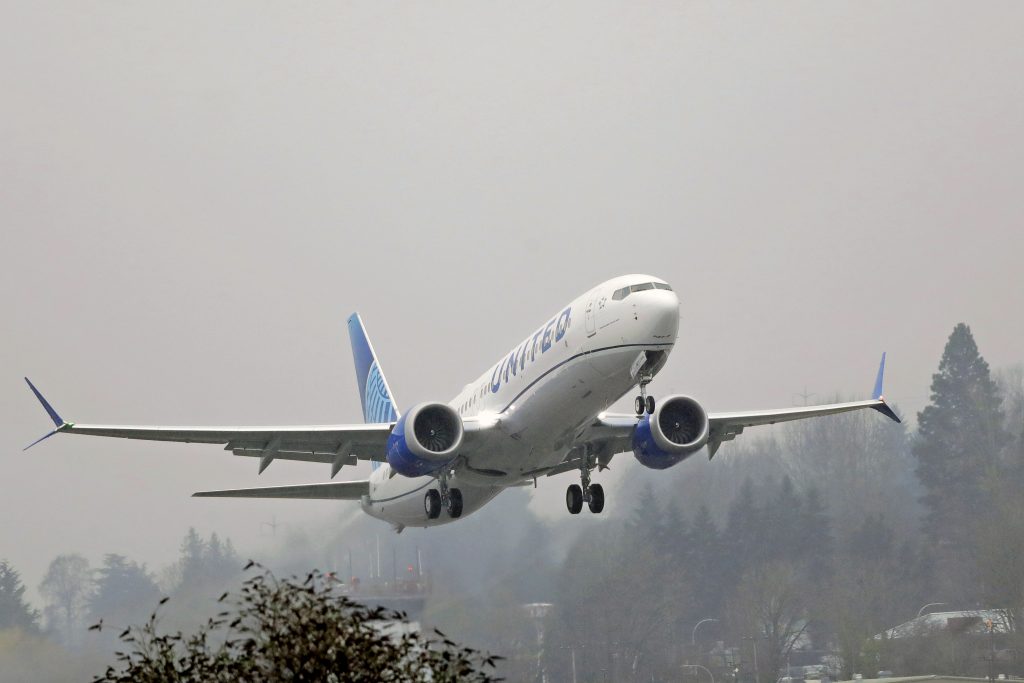 A United Airlines Boeing 737 Max airplane takes off in the rain. (Ted S. Warren/ AP Photo)