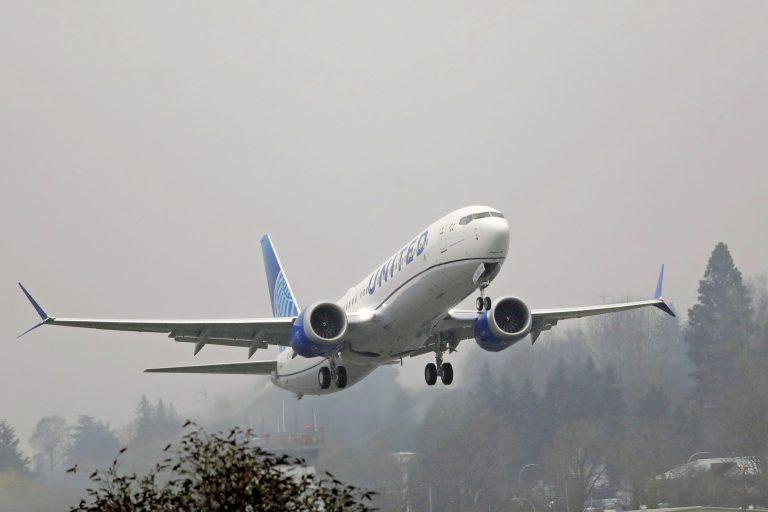 A United Airlines Boeing 737 Max airplane takes off in the rain. (Ted S. Warren/ AP Photo)