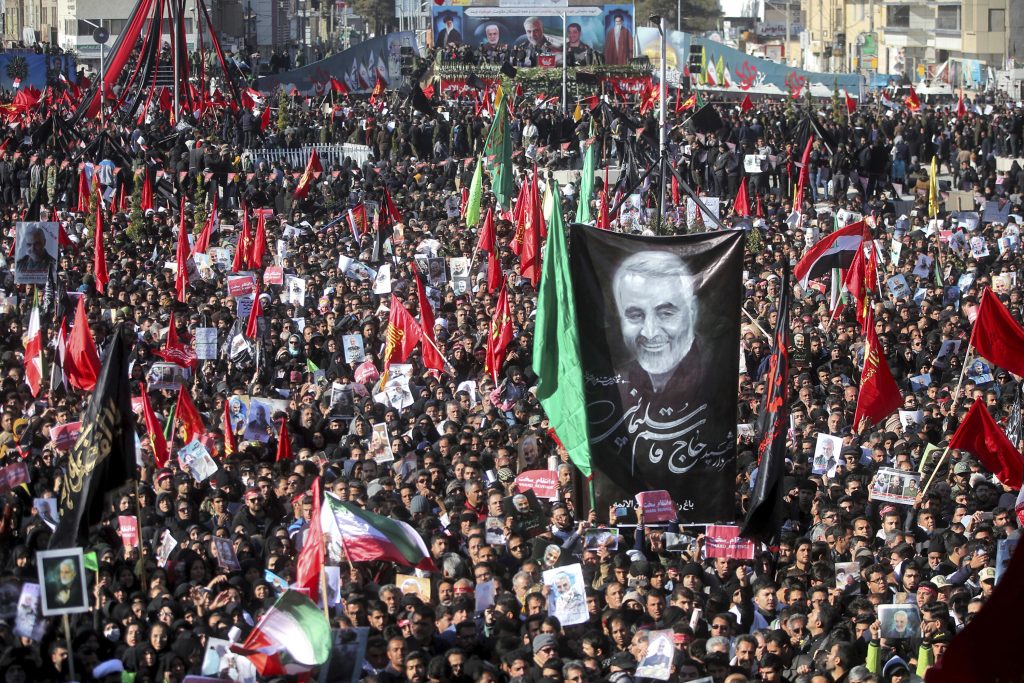 Iran Soleimani Mourners attend a funeral ceremony for Iranian Gen. Qassem Soleimani and his comrades, who were killed in Iraq in a U.S. drone strike on Friday, in the city of Kerman, Iran, Tuesday, Jan. 7, 2020. The leader of Iran's Revolutionary Guard threatened on Tuesday to