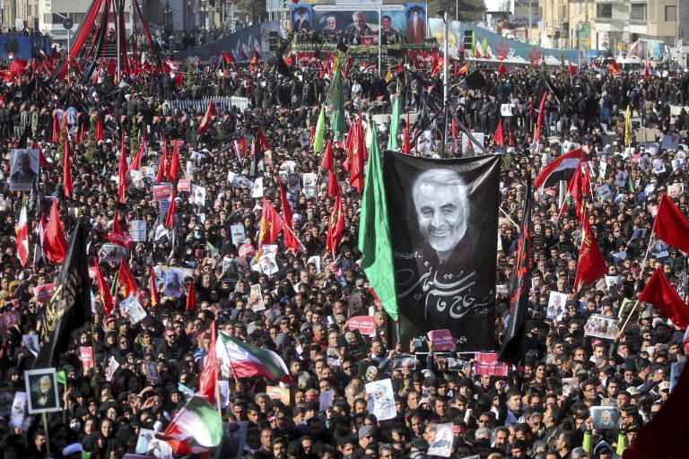 Mourners attend a funeral ceremony for Iranian Gen. Qassem Soleimani and his comrades, who were killed in Iraq in a U.S. drone strike on Friday, in the city of Kerman, Iran, Tuesday, Jan. 7, 2020. The leader of Iran's Revolutionary Guard threatened on Tuesday to 