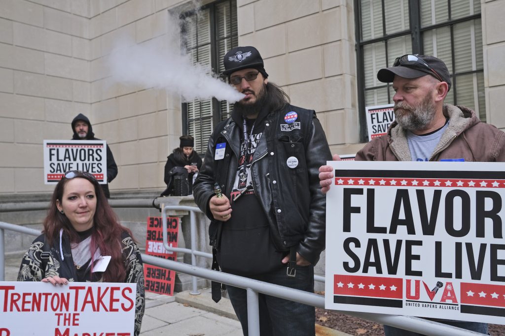 Vaping Ban New Jersey In this Jan. 13, 2020, file photo, Matthew Elliot, center, and other supporters of flavored vaping products protest at the state house in Trenton, N.J. (Seth Wenig/AP Photo)