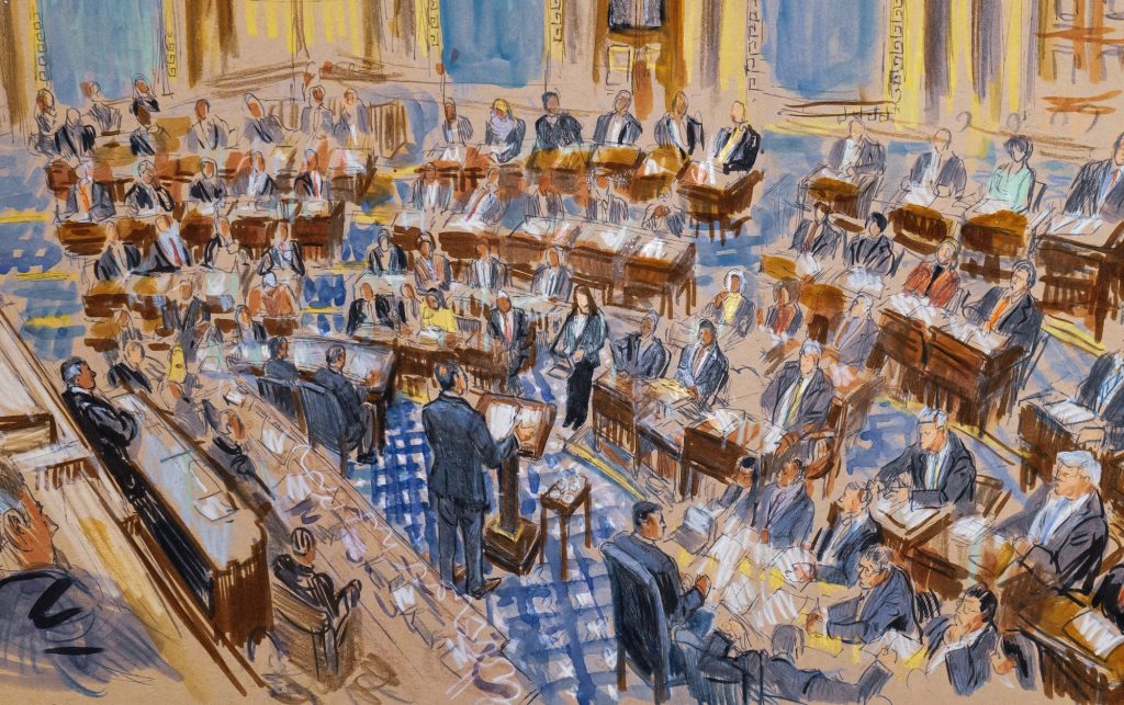 This drawing by Dana Verkouteren shows White House counsel Pat Cipollone delivering opening remarks in the Senate chamber during the first day of the impeachment trial against President Donald Trump on charges of abuse of power and obstruction of Congress, at the Capitol in Washington, Tuesday, Jan. 21, 2020. (J. Scott Applewhite/AP Photo)