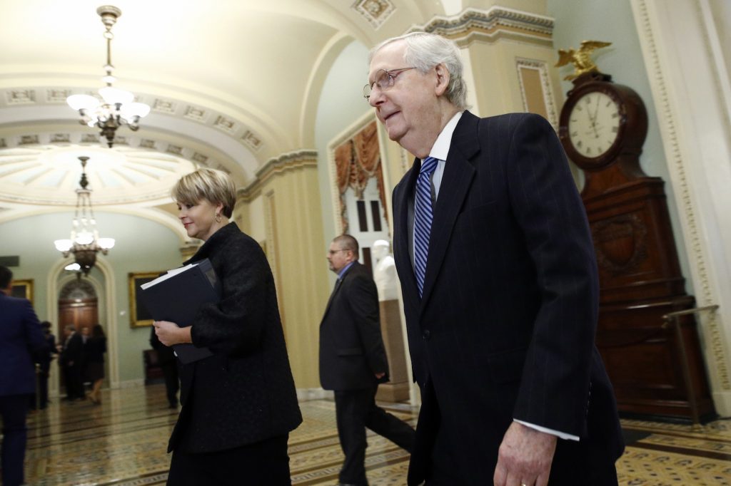 Senate Majority Leader Mitch McConnell, R-Ky., walks to the Senate Chambers for the Impeachment trial of President Donald Trump at the US Capitol Wednesday, Jan. 22, 2020, in Washington. (Steve Helber/AP Photo)