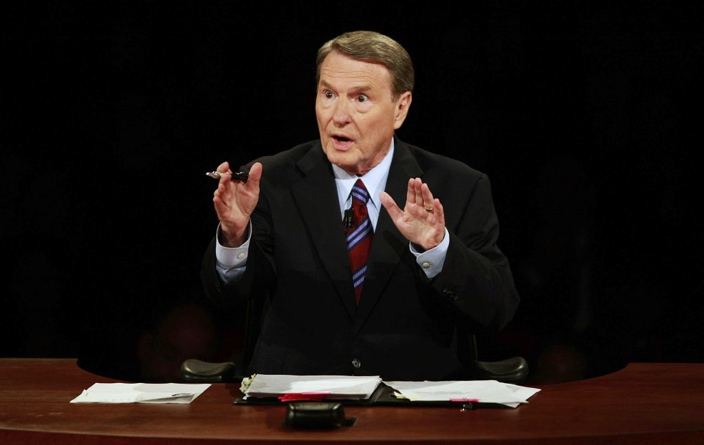 John McCain, Barack Obama FILE - This Sept. 26, 2008 file photo shows debate moderator Jim Lehrer during the first U.S. Presidential Debate between presidential nominees Sen. John McCain, R-Ariz., and Sen. Barack Obama, D-Ill., at the University of Mississippi in Oxford, Miss. PBS announced that PBS NewsHour's Jim Lehrer died Thursday, Jan. 23, 2020, at home. He was 85. (AP Photo/Chip Somodevilla, File)