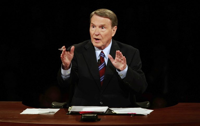 FILE - This Sept. 26, 2008 file photo shows debate moderator Jim Lehrer during the first U.S. Presidential Debate between presidential nominees Sen. John McCain, R-Ariz., and Sen. Barack Obama, D-Ill., at the University of Mississippi in Oxford, Miss.  PBS announced that PBS NewsHour's Jim Lehrer died Thursday, Jan. 23, 2020, at home. He was 85. (AP Photo/Chip Somodevilla, File)