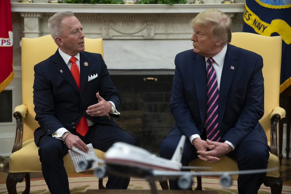 Trump-Party Switching Congressman In this Dec. 19, 2019 photo, President Donald Trump, right, meets with Rep. Jeff Van Drew in the Oval Office of the White House in Washington. (Evan Vucci/AP Photo)