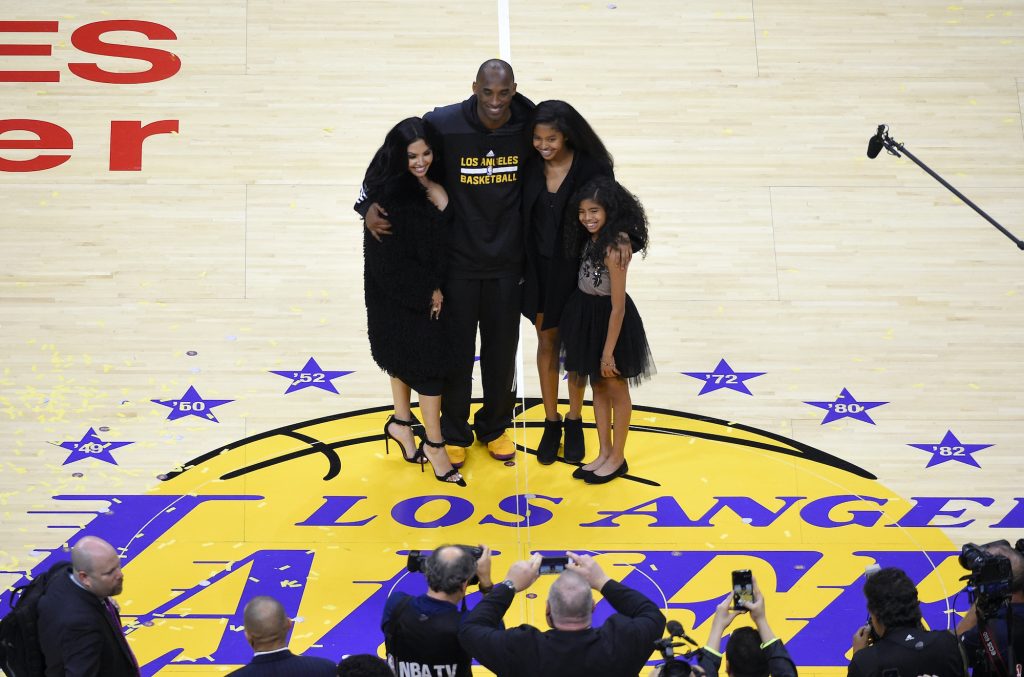 Kobe Bryant, Gianna Bryant, Natalia Bryant, Vanessa Bryant In this April 13, 2016, file photo, Los Angeles Lakers' Kobe Bryant poses for pictures with his wife Vanessa, left, and daughters Natalia, second from right, and Gianna as they stand on the court after an NBA basketball game against the Utah Jazz, in Los Angeles. (Mark J. Terrill/AP Photo)