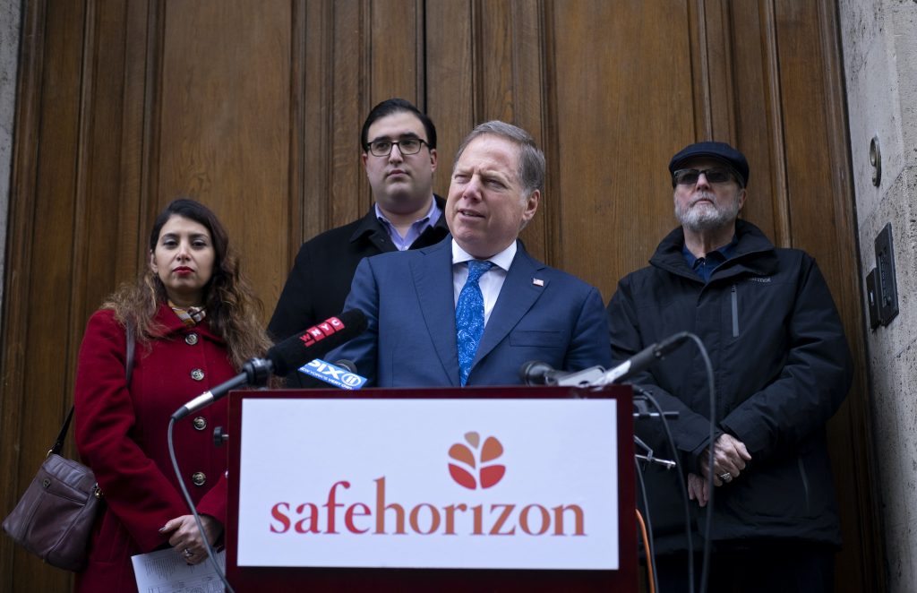 Jeffrey Epstein Prince Andrew U.S. Attorney Geoffrey Berman, standing with victims of childhood sexual abuse, speaks at an event held by Safe Horizon, a non-profit victim services agency, in front of Jeffrey Epstein's Manhattan residence as they raise awareness for New York State's Child Services Act, Monday, Jan. 27, 2020, in New York. (Craig Ruttle/AP Photo)
