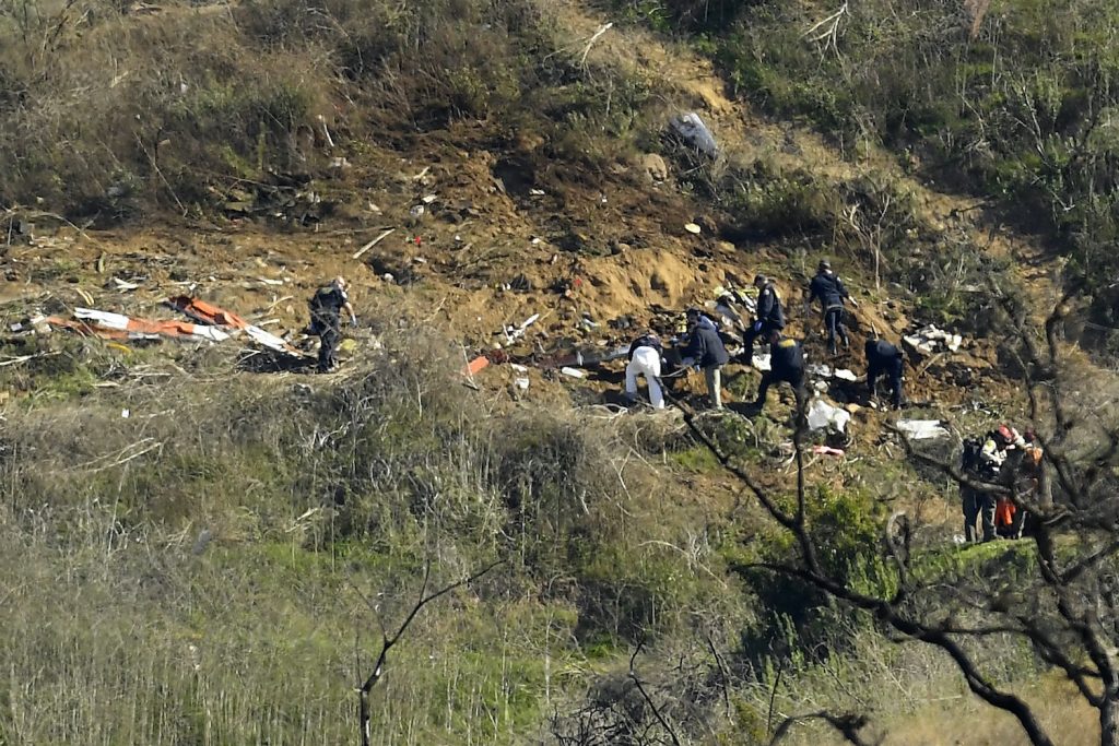 Helicopter Crash Kobe Bryant Killed Investigators work the scene of a helicopter crash