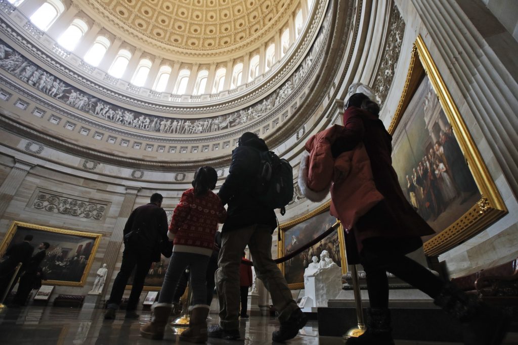 Trump Impeachment Visitors follow a tour guide into the rotunda at the U.S. Capitol, Wednesday Jan 29, 2020, in Washington. (Steve Helber/AP Photo)