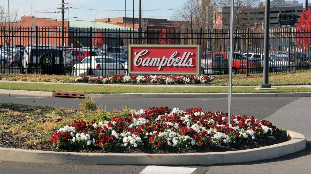 Campbell's headquarters with a flower garden