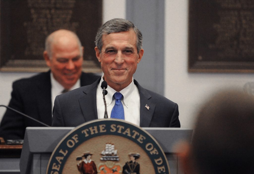 DelawareGovJohnCarney6 Delaware Governor John Carney grins during his 2020 State of the State address at Legislative Hall in Dover, Delaware on Thursday, Jan. 23, 2020. (Butch Comegys for WHYY)