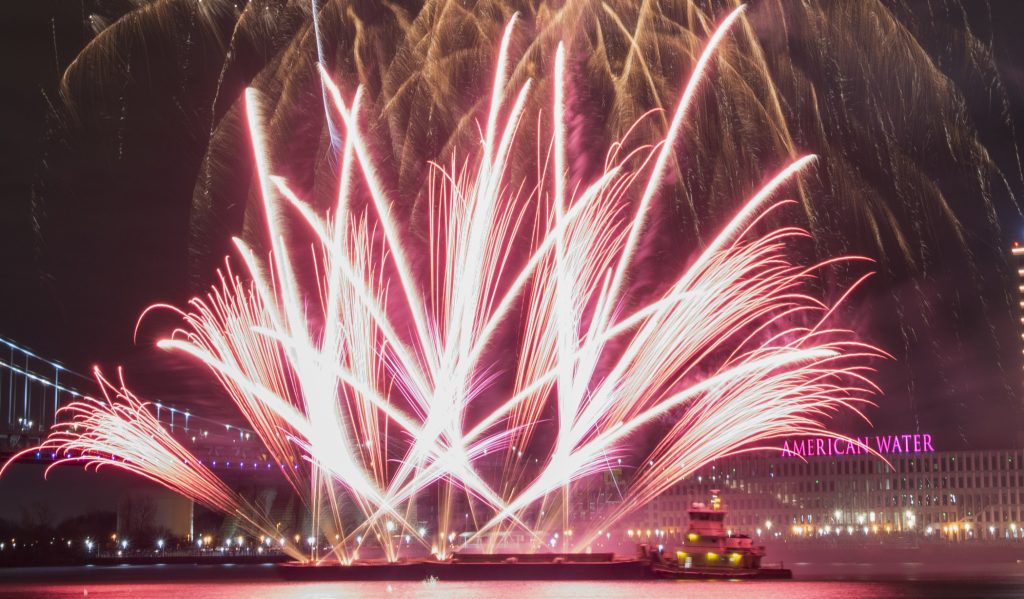 FIREWORKS 2020 Fireworks are launched from a barge during the midnight display at Penn's Landing.