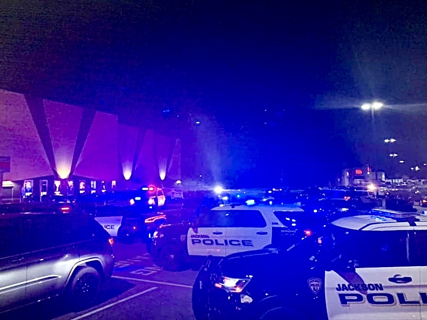 IMG-5674 Police converge on a Howell movie theatre Wednesday evening after fireworks lit outside caused panic inside the building. (Image courtesy of Kelsey Disher via JSHN)