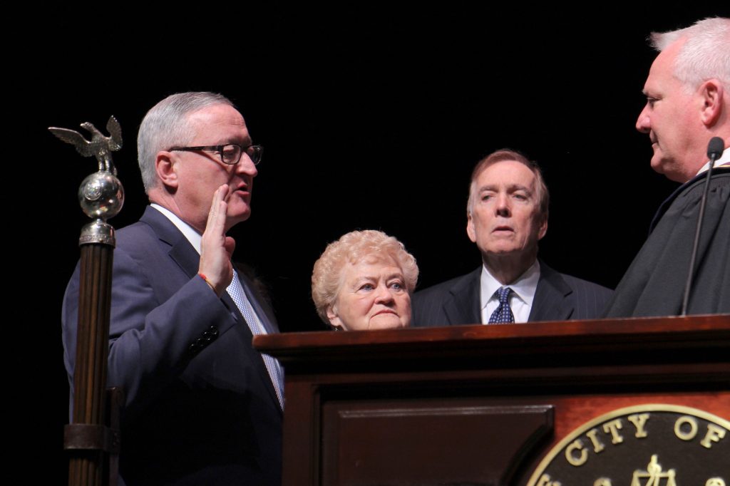Image from iOS (31) Mayor Jim Kenney is sworn in to his second term, flanked by his mother, Barbara. (Emma Lee/WHYY)