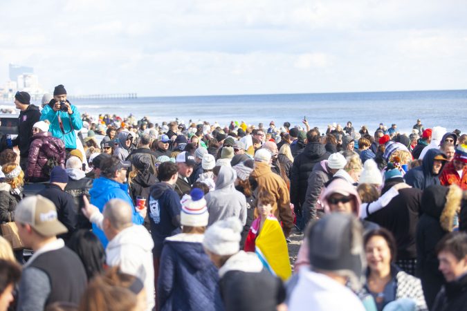 Crowd gathers before the 2020 polar bear plunge in Margate, NJ on Wednesday, January 1, 2020. (Miguel Martinez for WHYY)