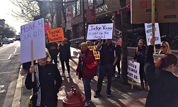 Younge-protest-Article-201804241536 Protesters gather at the corner of 4th and Market streets in Center City to rally against Philadelphia Family Court Judge Lyris F. Younge. (P.J. D’Annunzio/The Legal Intelligencer)