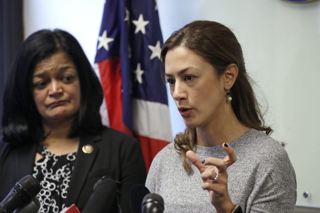 Rep. Pramila Jayapal, D-Wash., looks on as Negah Hekmati talks about her hours-long delay returning to the U.S. from Canada with her family days earlier, at a news conference on Monday. Rep. Pramila Jayapal, D-Wash., looks on as Negah Hekmati talks about her hours-long delay returning to the U.S. from Canada with her family days earlier, at a news conference on Monday. (Elaine Thompson/AP Photo)