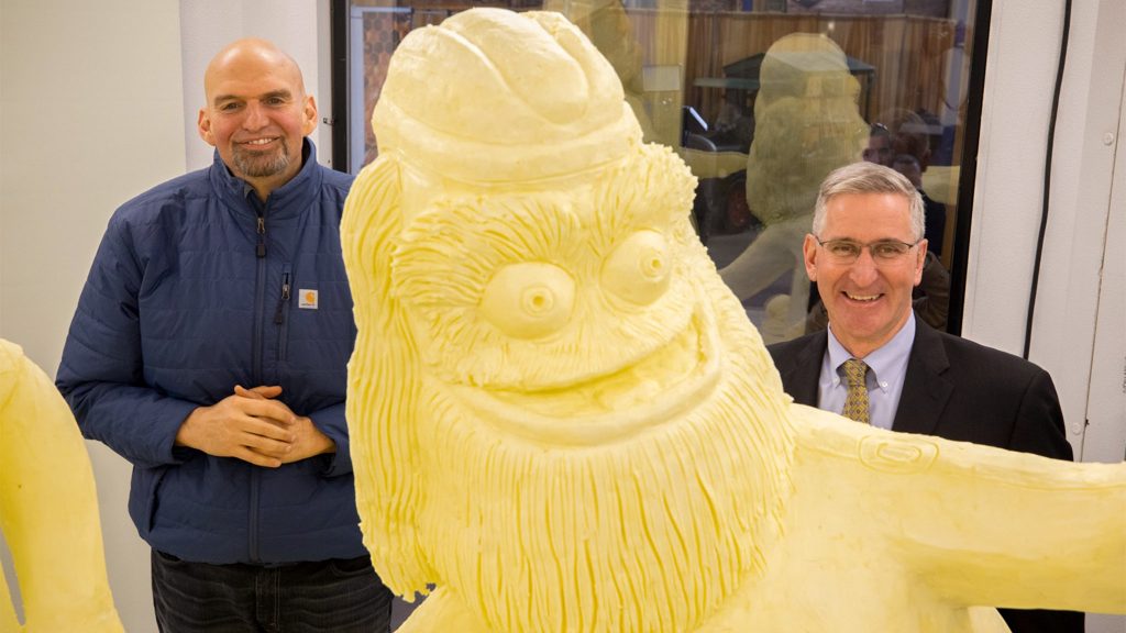 2020 Farm Show Butter Sculpture Unites Consumers Through Things They Love: Good Food, Celebration, Pro-Sports Mascots Lt. Gov. John Fetterman and Secretary of Agriculture Russell Redding pal it up with Butter Gritty