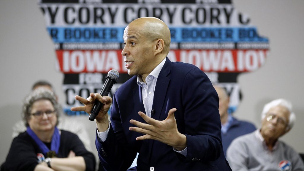 Cory Booker FILE - In this Jan. 9, 2020 file photo, Democratic presidential candidate, Sen. Cory Booker, D-N.J., speaks during a campaign event in North Liberty, Iowa. Booker has dropped out of the presidential race after failing to qualify for the December primary debate. (AP Photo/Patrick Semansky)