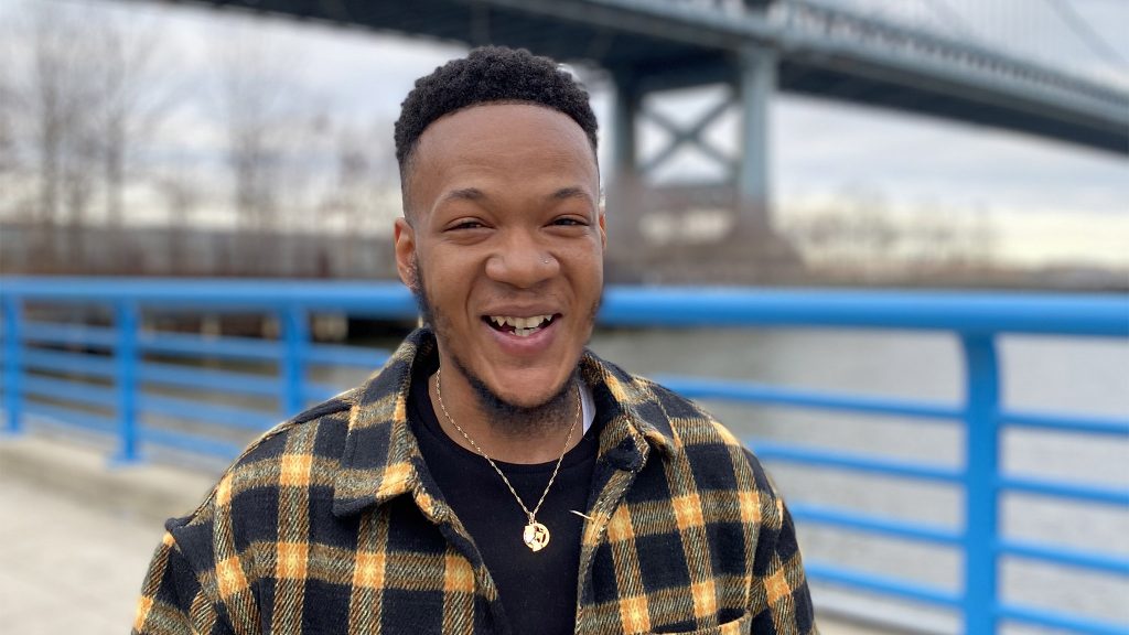 darnellschoolfield-drwc-crop DRWC digital content creator Darnell Schoolfield in front of the Ben Franklin Bridge. (Courtesy of DRWC)