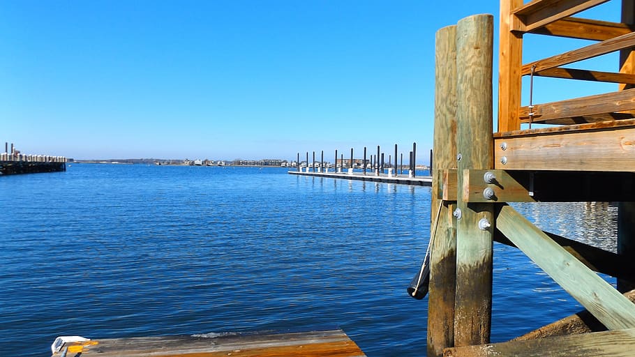 dock-water-harbor-sea-bay Firefighters jumped into the chilly back bay to rescue a dog on New Year's Eve, officials say. (Public domain image)