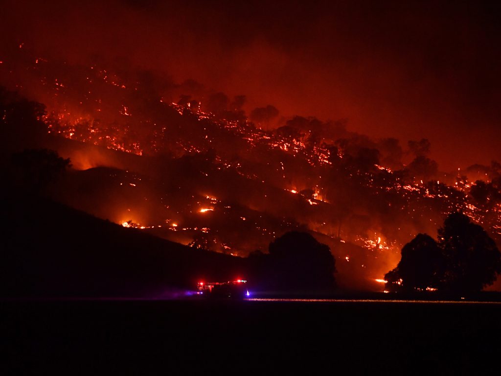 Firefighters conduct property protection patrols at the Dunn Road Fire on Friday in Mount Adrah, Australia. New South Wales is battling severe fire conditions, with high temperatures and strong winds forecast across the state. Firefighters conduct property protection patrols at the Dunn Road Fire on Friday in Mount Adrah, Australia. (Sam Mooy/Getty Images)