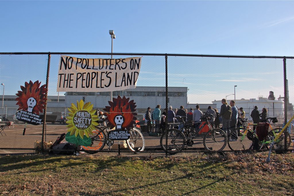 2020 02 03-e lee-pes refinery-protest Protesters gather in a parking lot at the Philadelphia Energy Solutions refinery office on Passayunk Avenue in South Philadelphia on Feb. 9, 2020. (Emma Lee/WHYY)