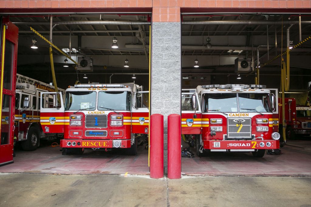 Hounds walk to help save others of their kind Fire trucks are parked inside Liberty Fire Station on Broadway in Camden, N.J. (Miguel Martinez for WHYY)
