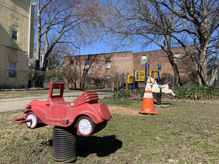 A playground on Powelton Avenue, purchased from the City of Philadelphia for $1, has been sold to a developer. (Kelly Brennan/WHYY)