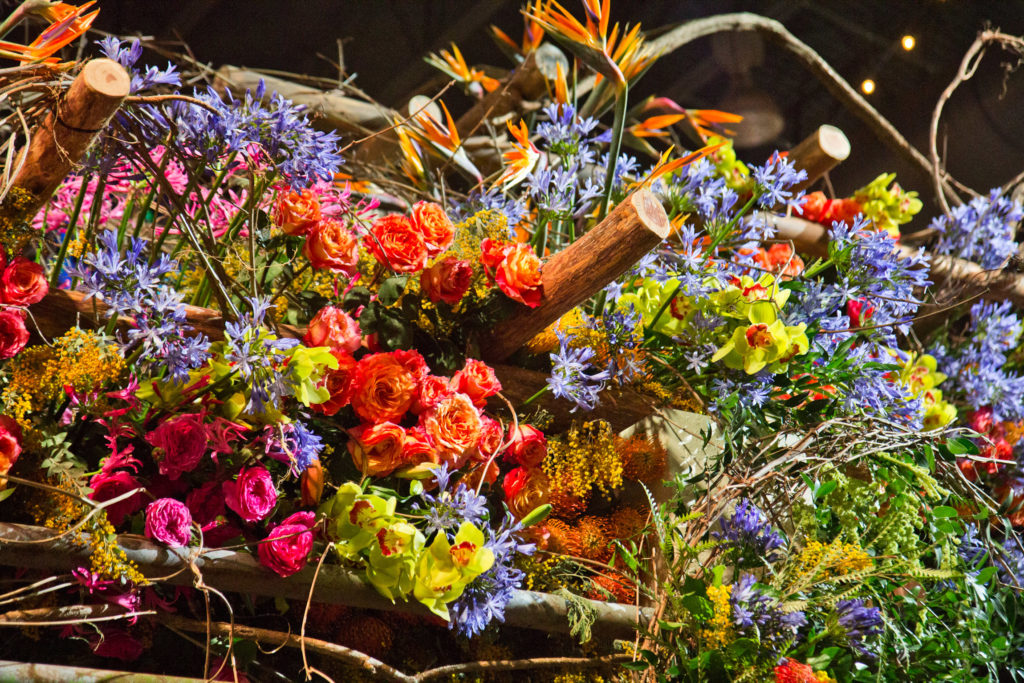 2020 2 27 k paynter flower show setup Flowers atop the main exhibit of the 2020 Philadelphia Flower Show, themed “Rivera Holiday.” (Kimberly Paynter/WHYY)