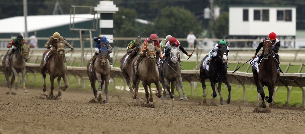 To Honor and Serve, right, with jockey Jose Lezcano aboard, heads to the finish line during the running of the Pennsylvania Derby horse race at Parx Racing, Saturday, Sept. 24, 2011, in Bensalem, Pa. Alex Brandon/AP Photo)