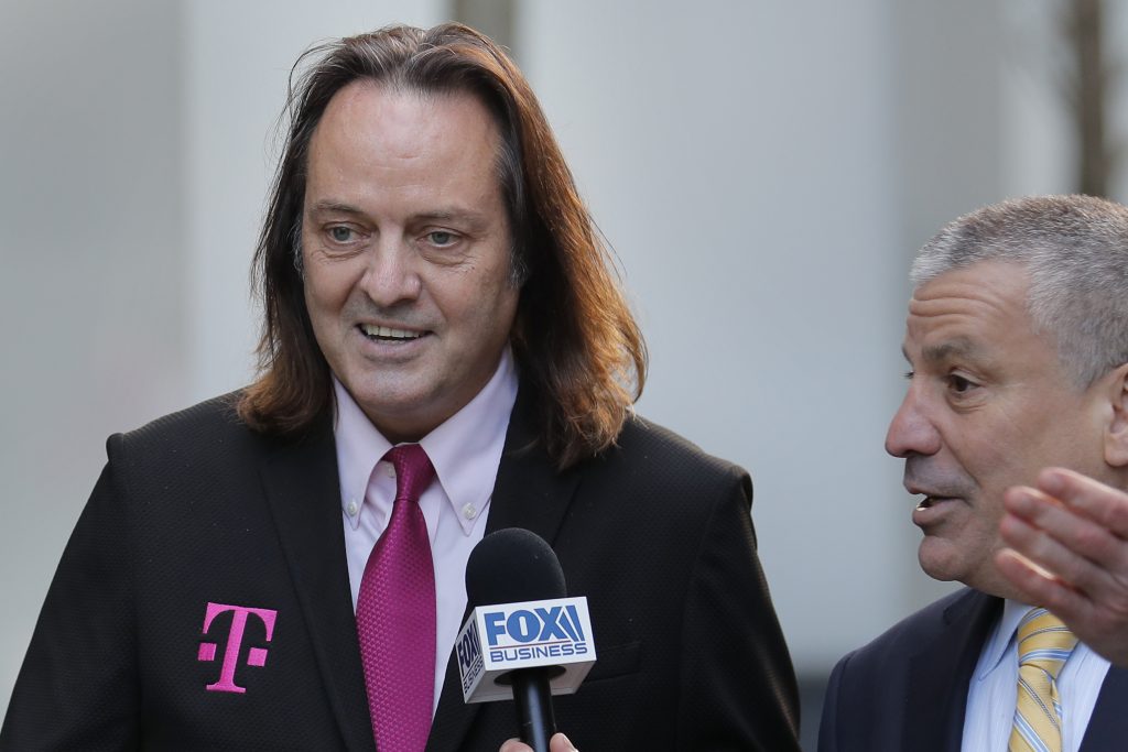 John Legere T-Mobile chief executive John Legere speaks to reporters as he leaves the courthouse in New York, Wednesday, Jan. 15, 2020. Legere was in court to hear closing arguments in the case that could permit T-Mobile to merge with Sprint. (AP Photo/Seth Wenig)
