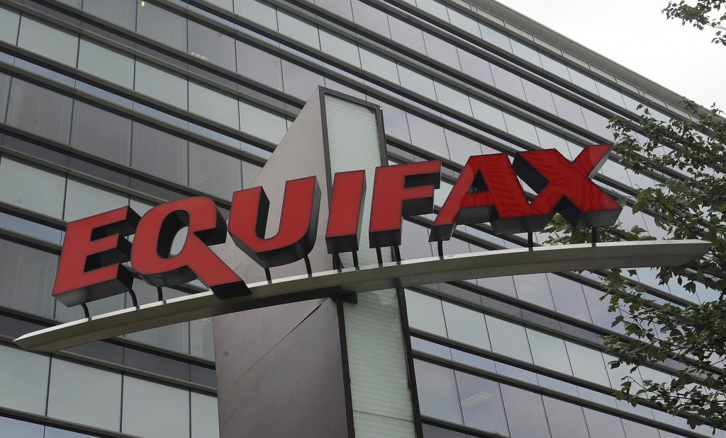 Equifax Inc. FILE - This July 21, 2012, file photo shows signage at the corporate headquarters of Equifax Inc. in Atlanta. The deadline to seek cash payments and claim free services as part of Equifax's $700 million settlement over a massive data breach is Wednesday, Jan. 22, 2020. (AP Photo/Mike Stewart, File)