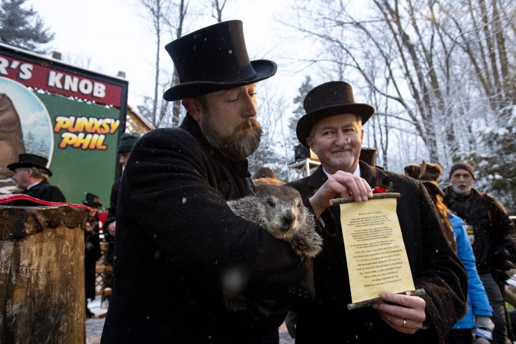 Groundhog Day Groundhog Club co-handler Al Dereume holds Punxsutawney Phil, the weather prognosticating groundhog, during the 134th celebration of Groundhog Day on Gobbler's Knob in Punxsutawney, Pa. (Barry Reeger/AP Photo)